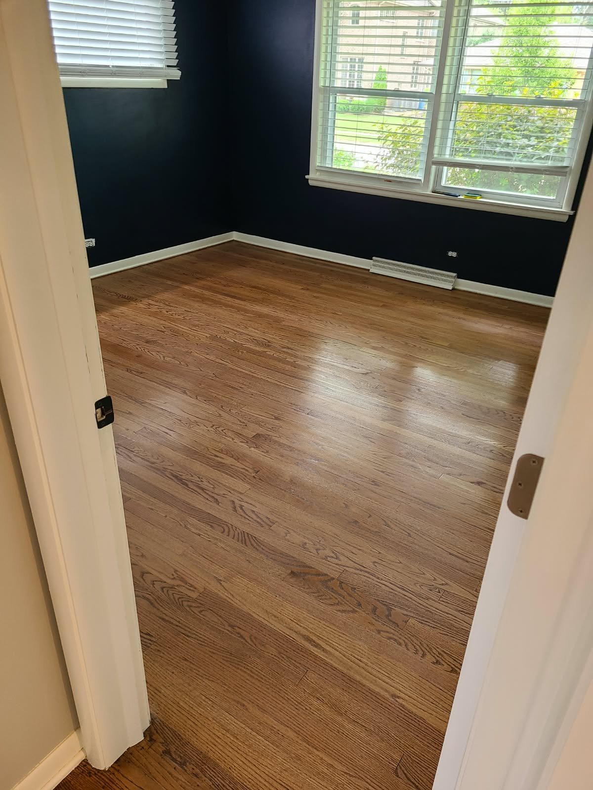 Hardwood floor after professional recoat and buff and coat service