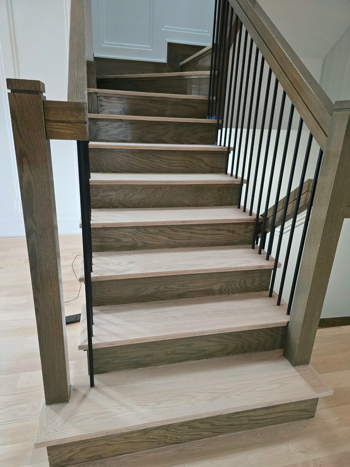 Hardwood stair refinishing after sanding