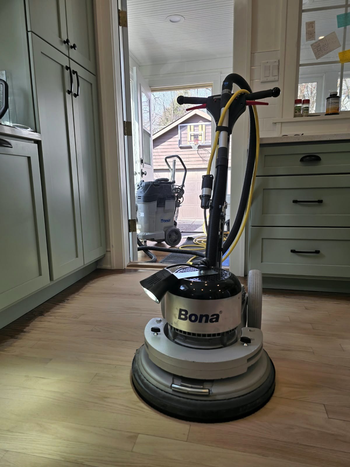 Hardwood floor scratch repair after localized sanding by RZR Hardwood Flooring