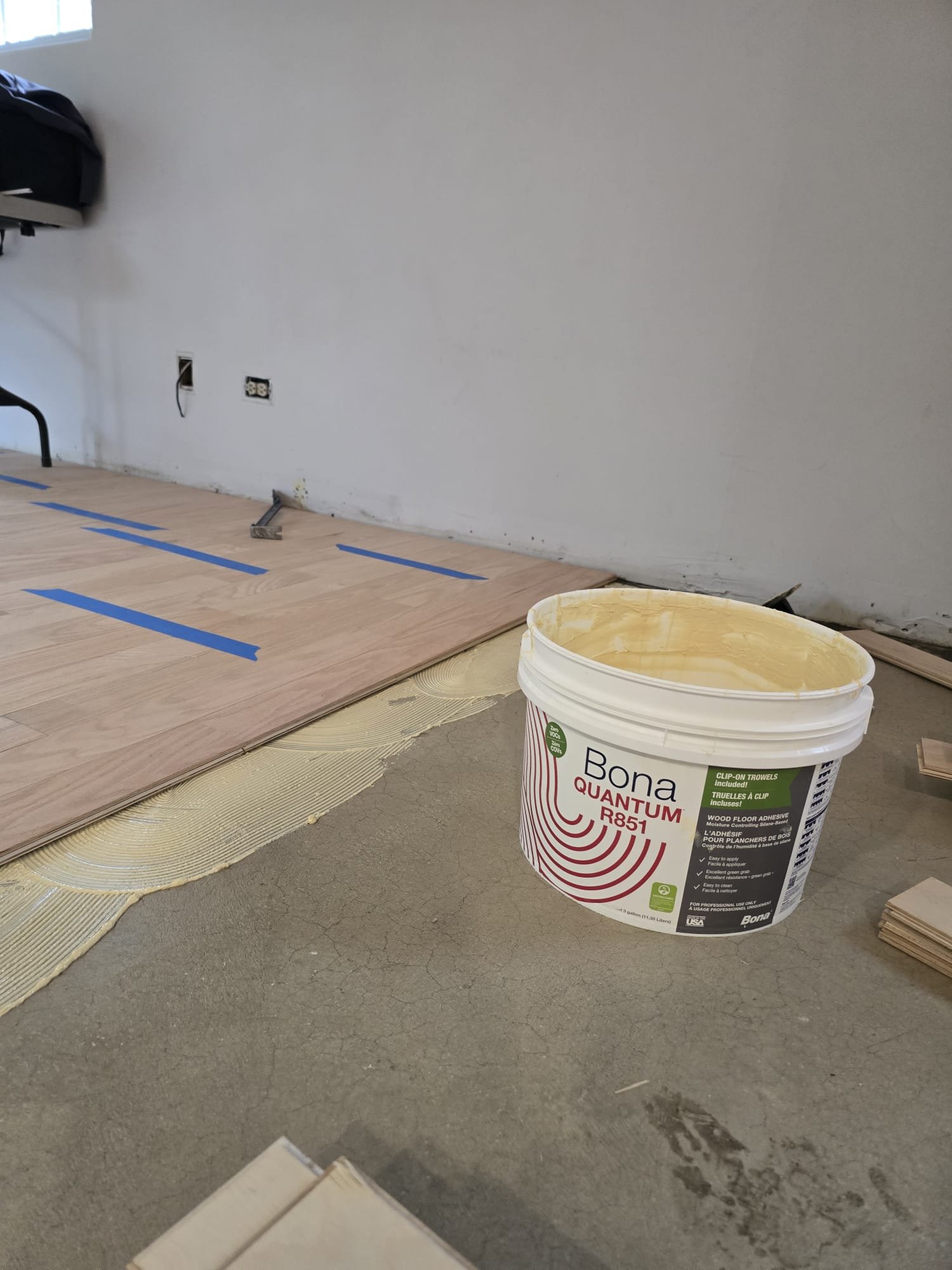 Unfinished engineered hardwood full glue-down installation with Bona adhesive