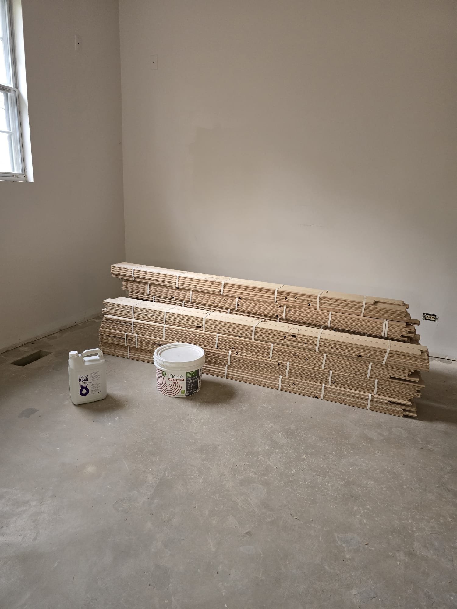 Unfinished engineered hardwood flooring and Bona products for full glue-down installation