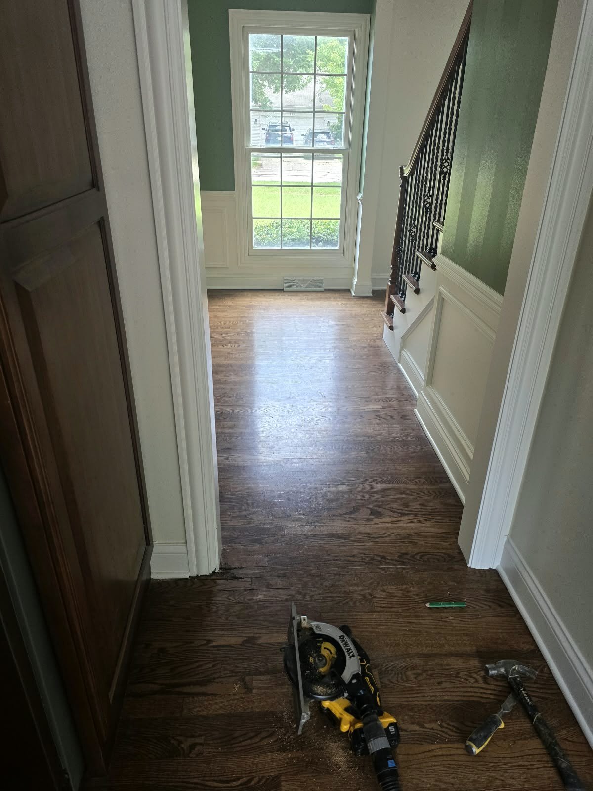 Water damaged hardwood boards before localized floor repair